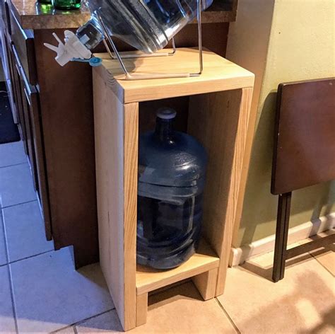 5 gallon water jug storage cabinet